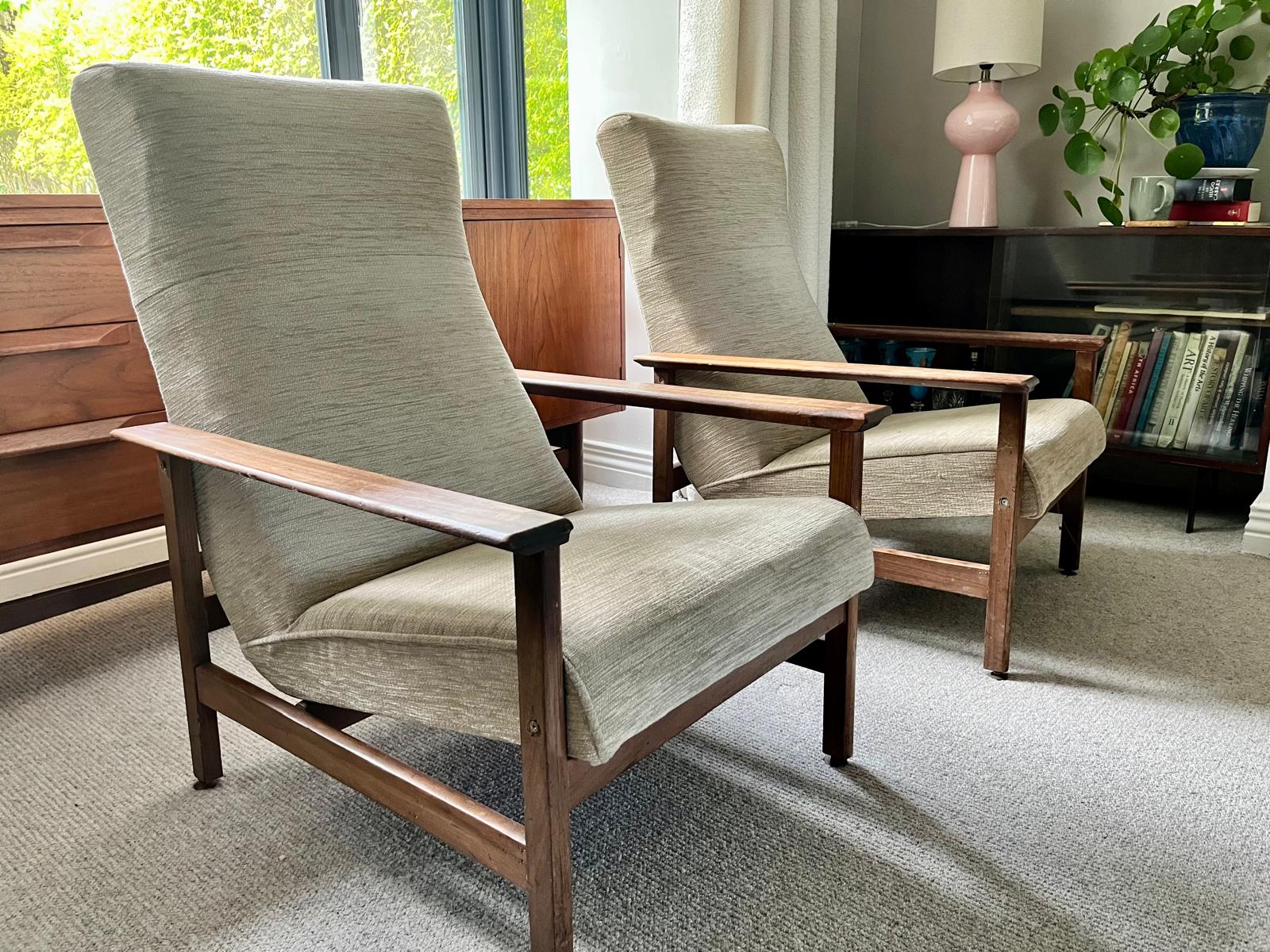 Pair of mid century armchairs with porridge fabric.