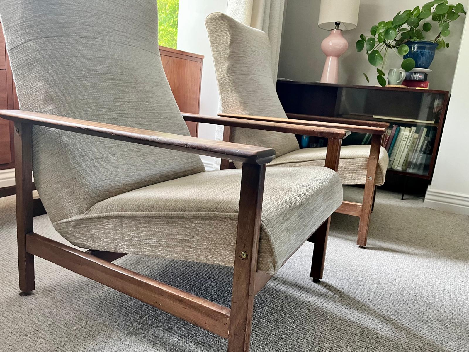 Pair of mid century armchairs with porridge fabric.