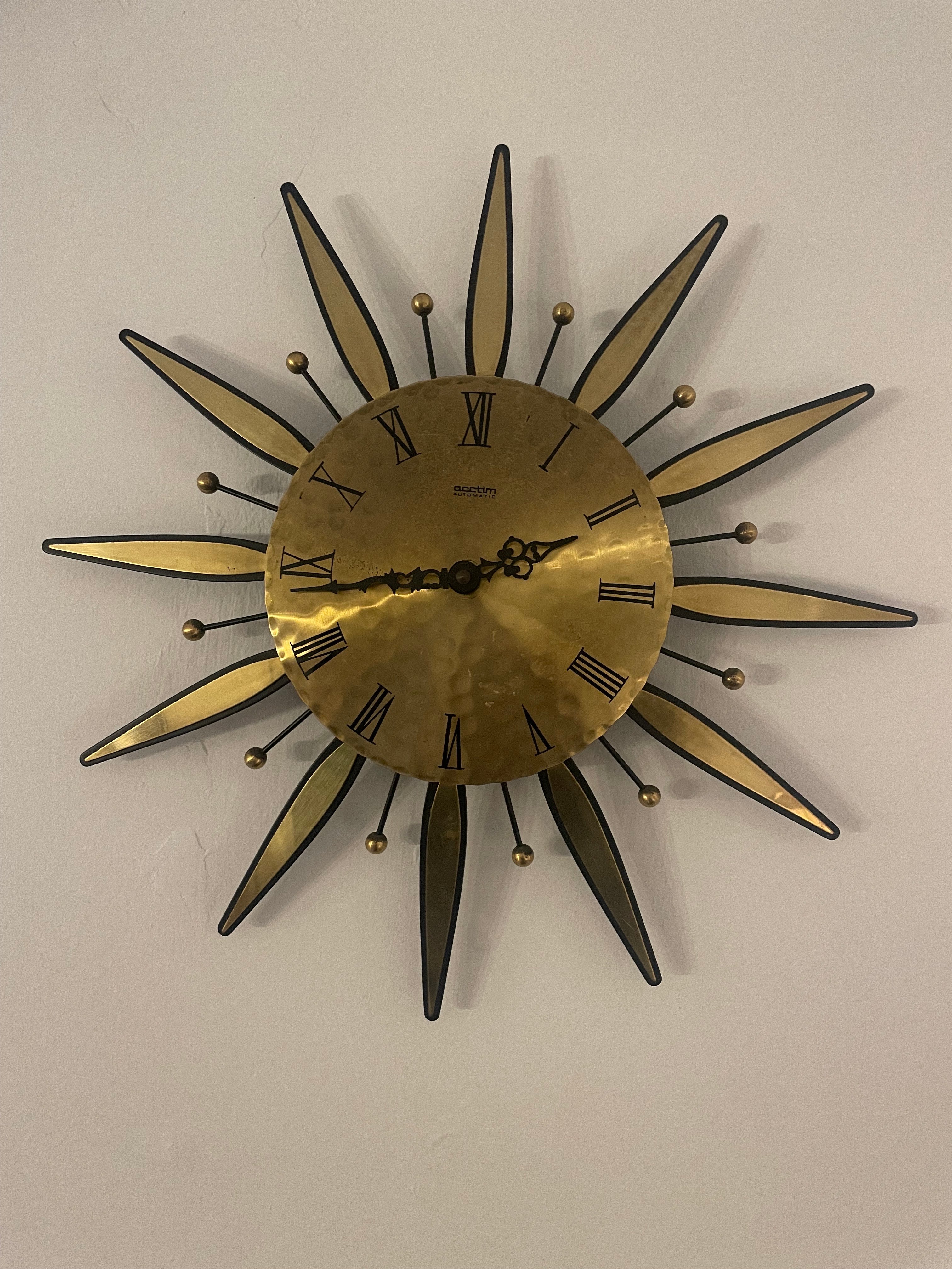 1960s Acctim automatic brass sunburst wall clock