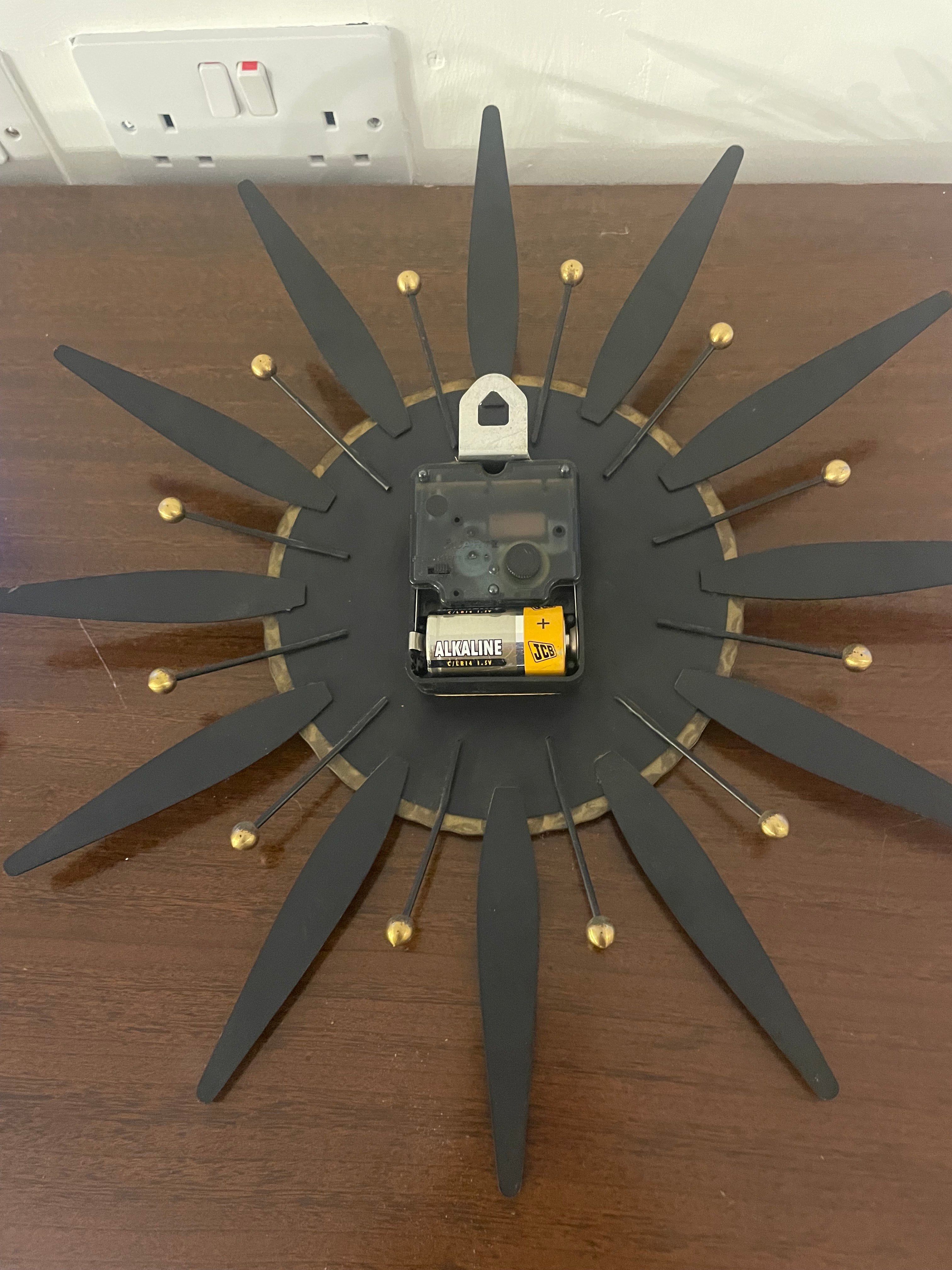 1960s Acctim automatic brass sunburst wall clock