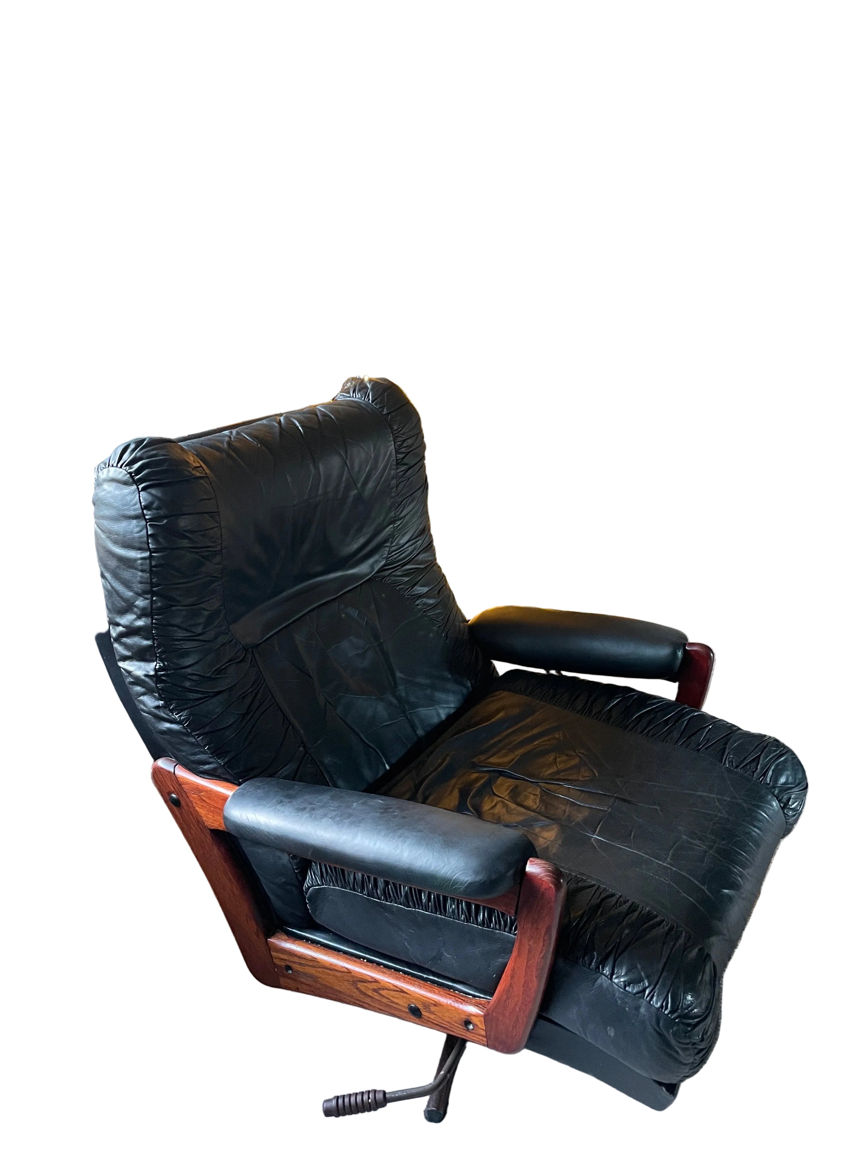 Mid Century Danish Black leather swivel armchair