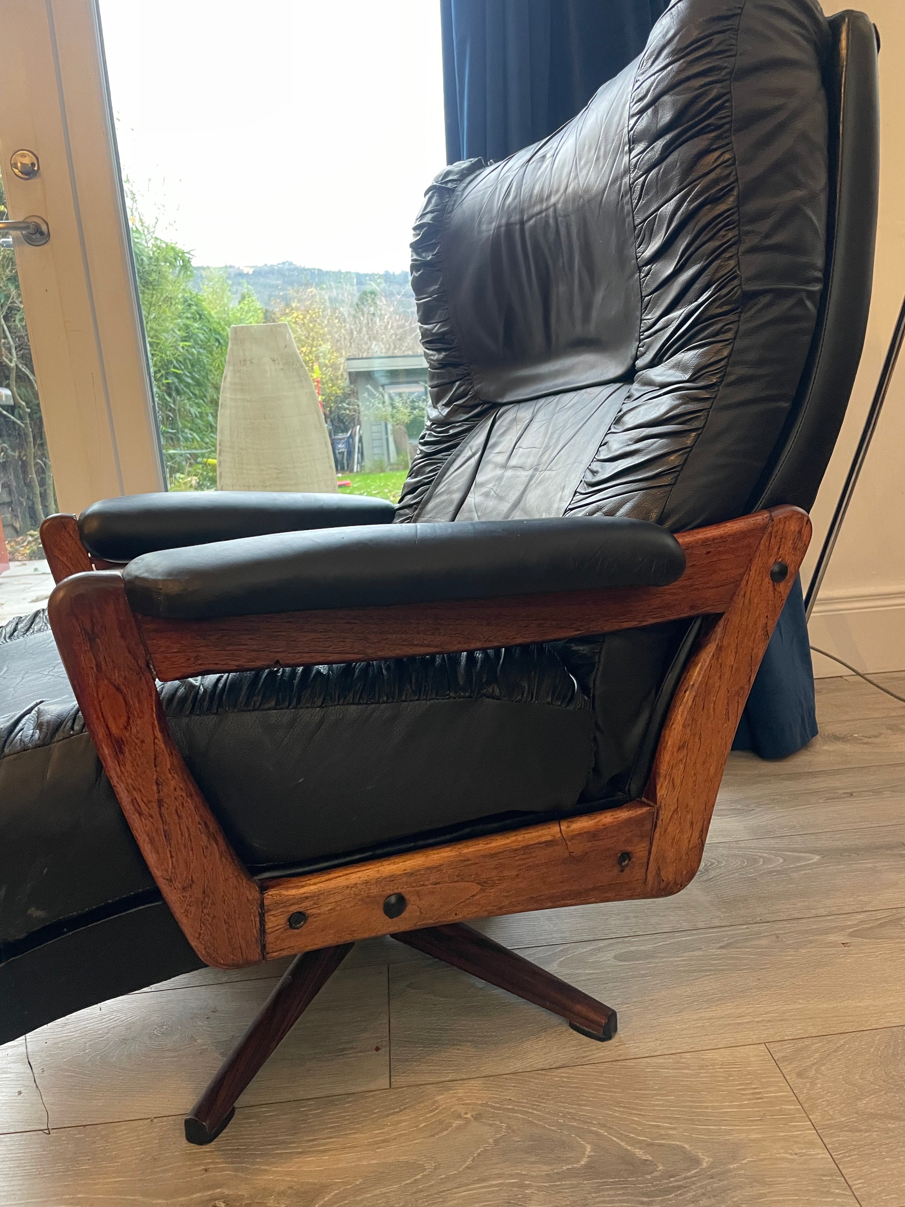 Mid Century Danish Black leather swivel armchair