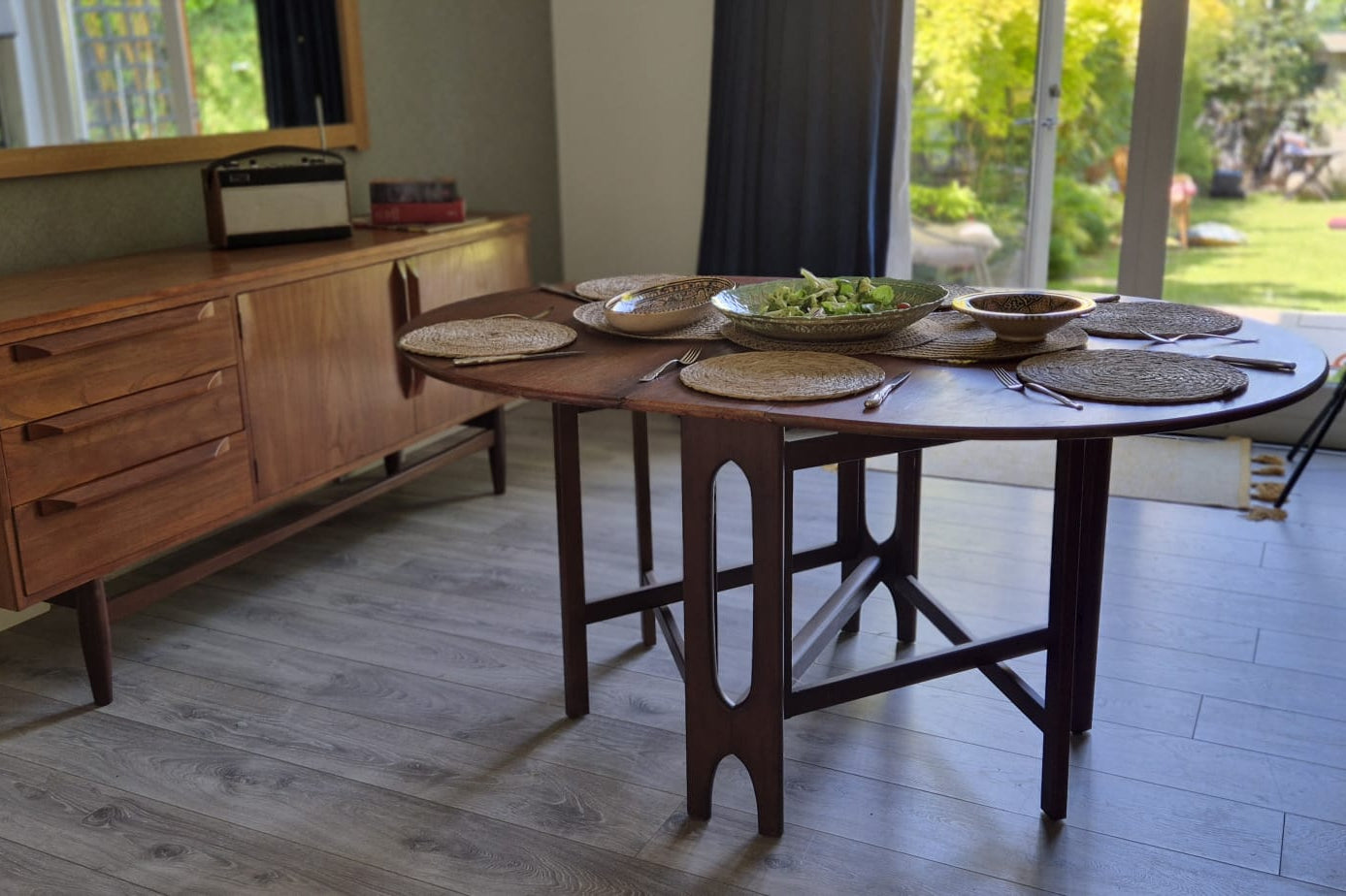 A Teak and Beech Drop Leaf Dining Table by Jentique, C.1970.