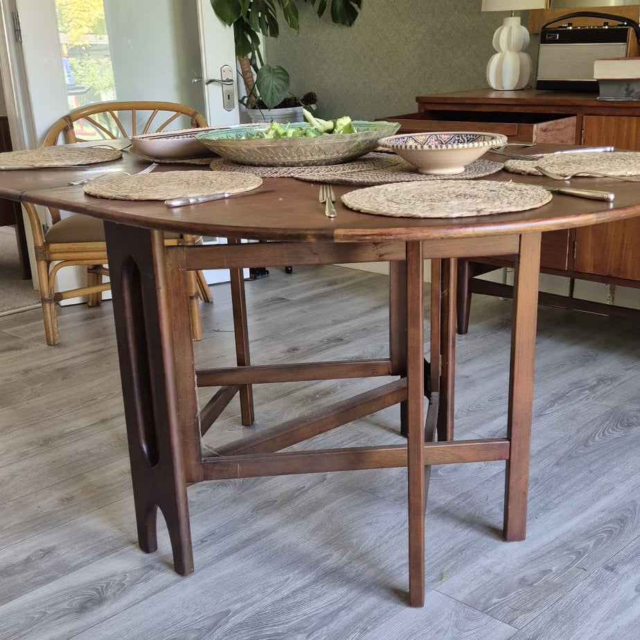 A Teak and Beech Drop Leaf Dining Table by Jentique, C.1970.