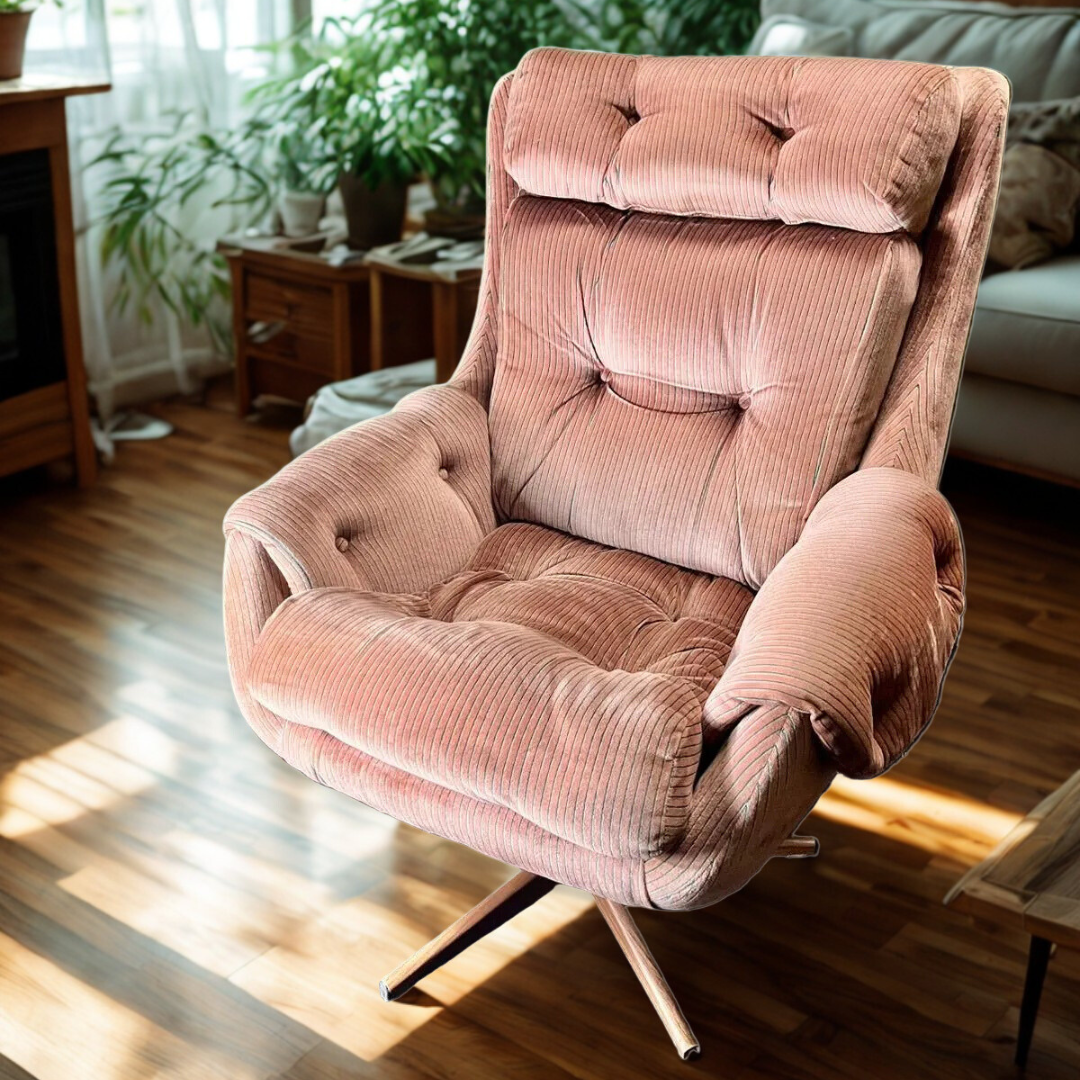 Mid century modern dusty pink swivel armchair
