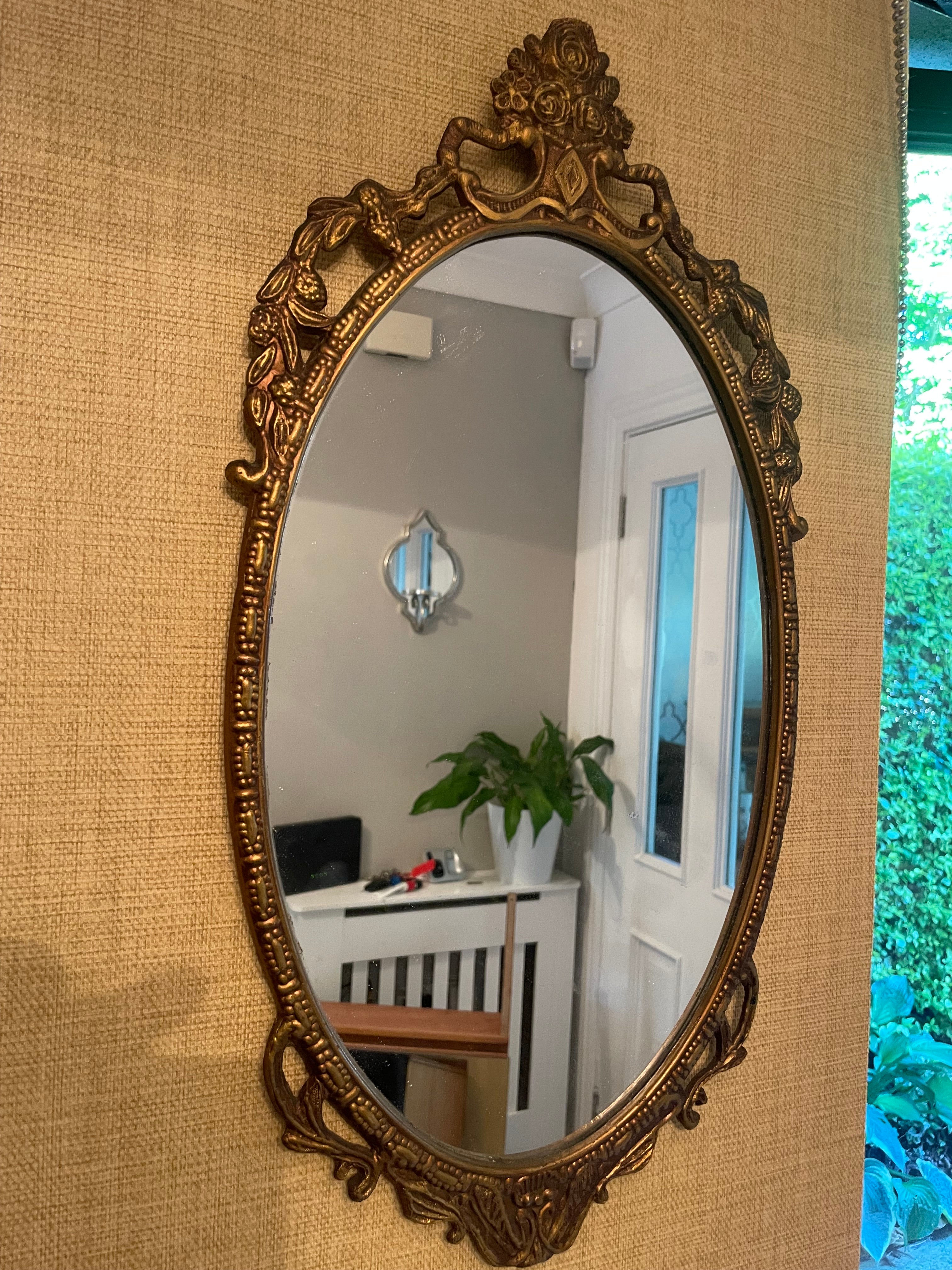 Vintage oval Gilt mirror