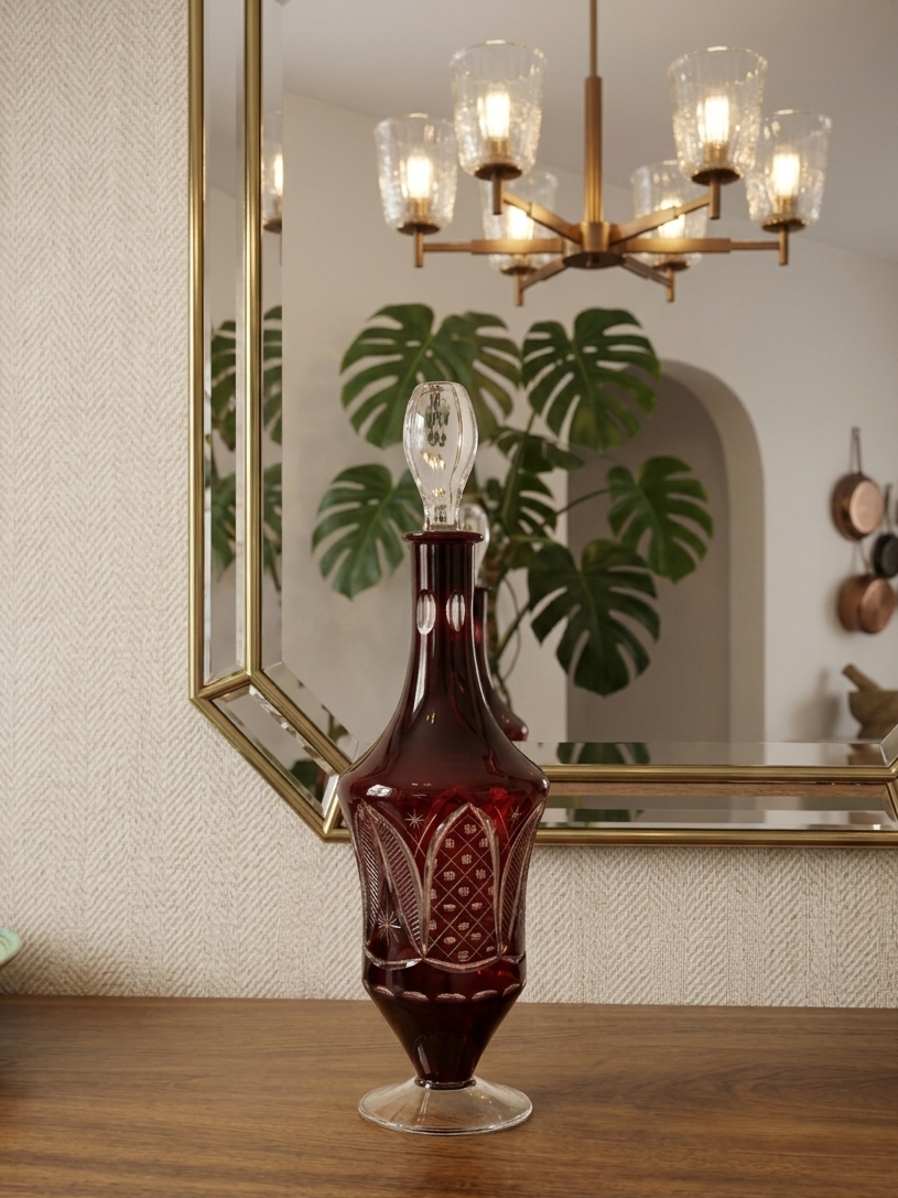 A vintage Bohemian style ruby glass decanter