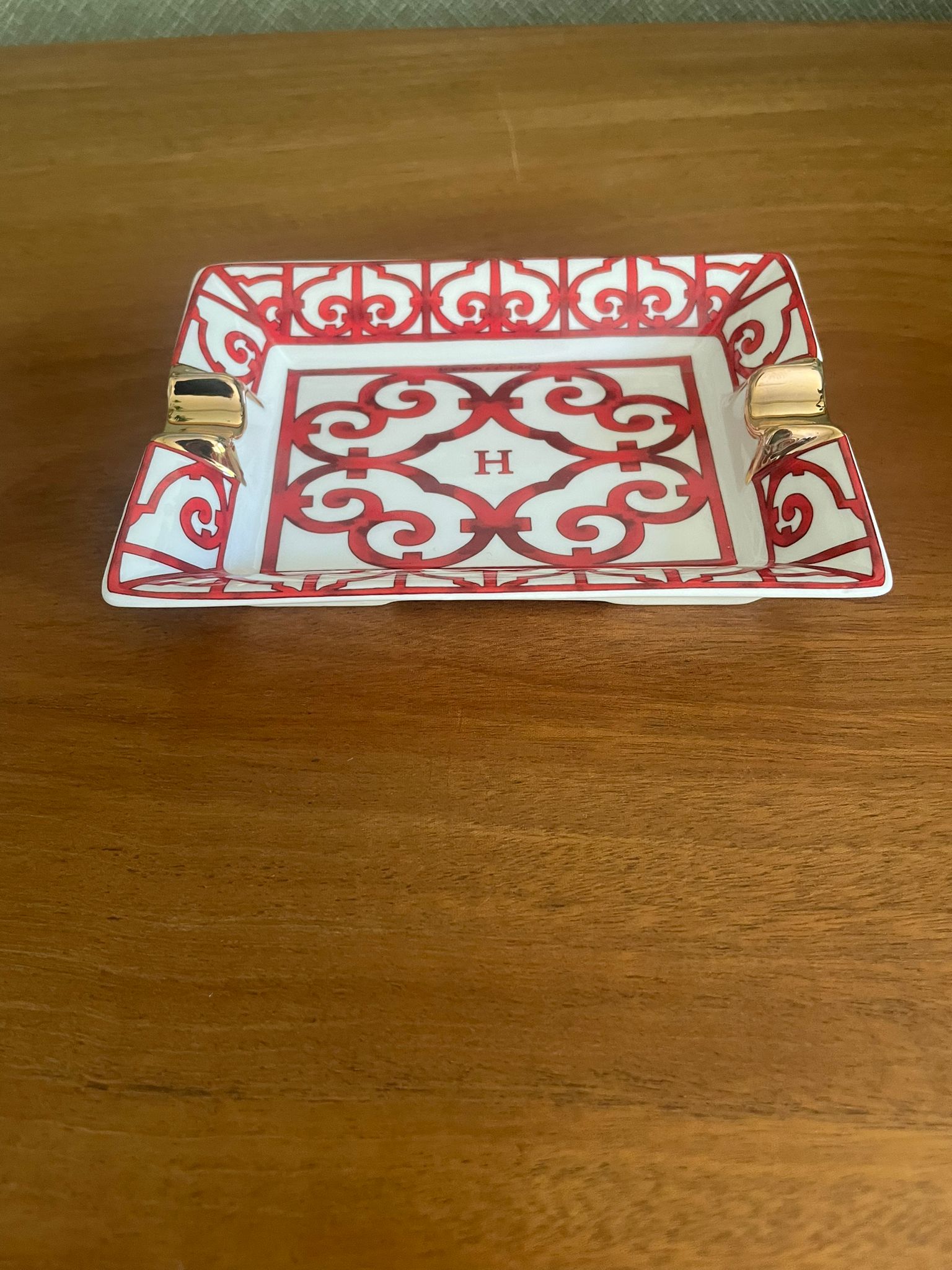 A Hermès Balcon du Guadalquivir Porcelain Ashtray.