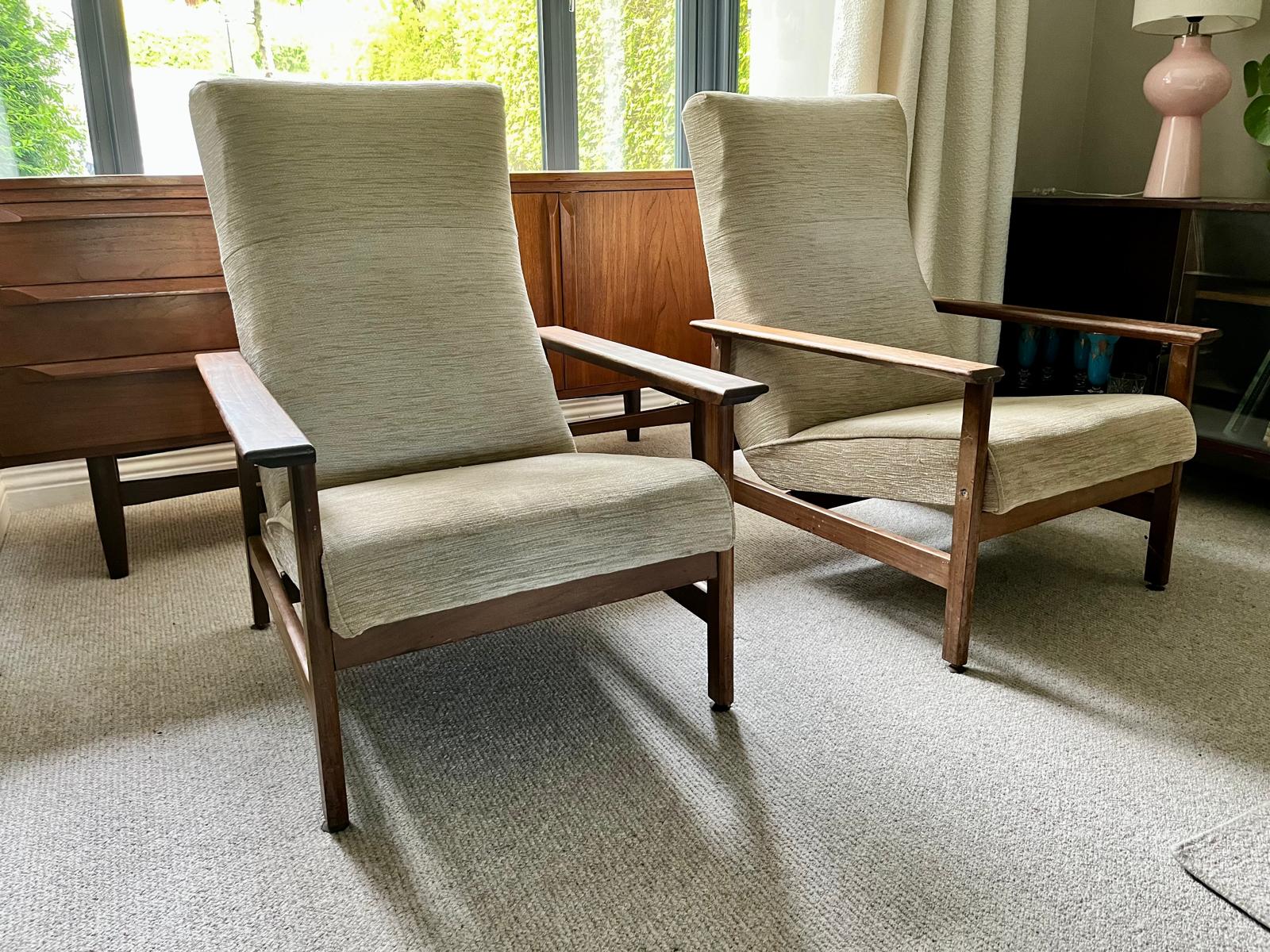Pair of mid century armchairs with porridge fabric.