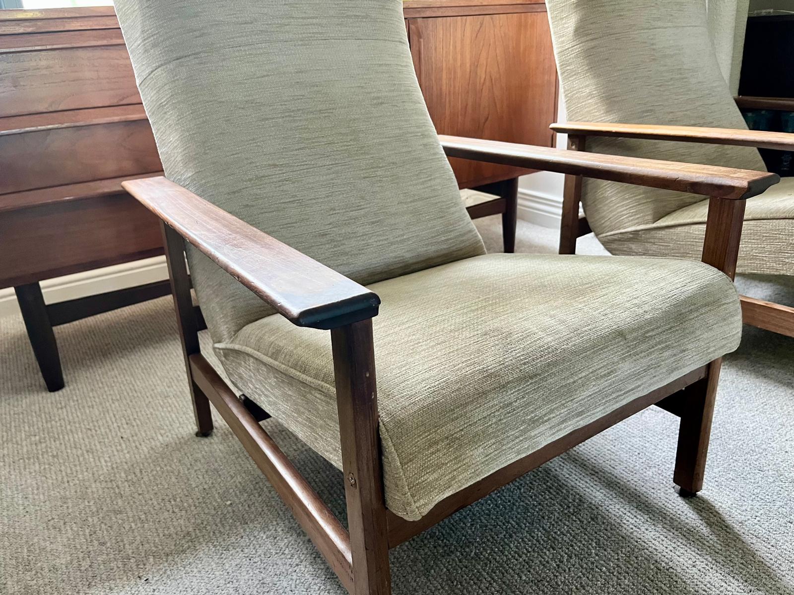 Pair of mid century armchairs with porridge fabric.