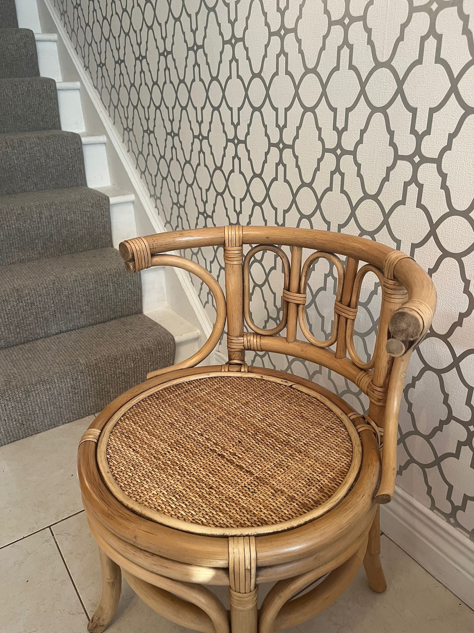 A pair of Bentwood curved cane chair