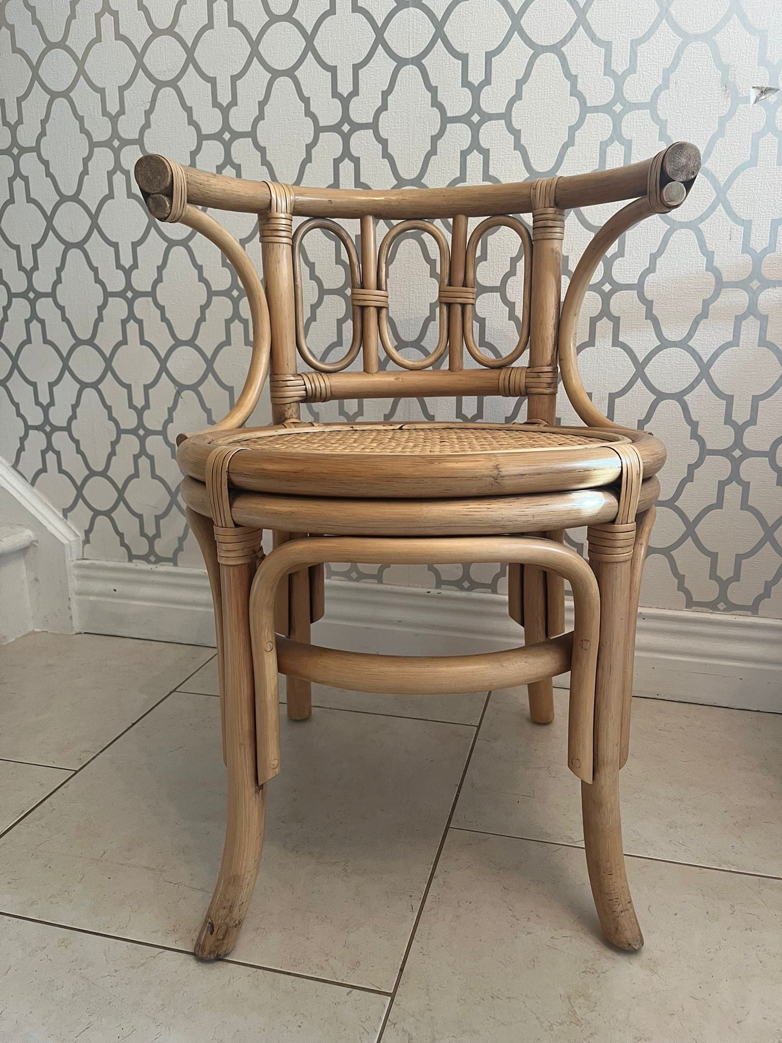 A pair of Bentwood curved cane chair