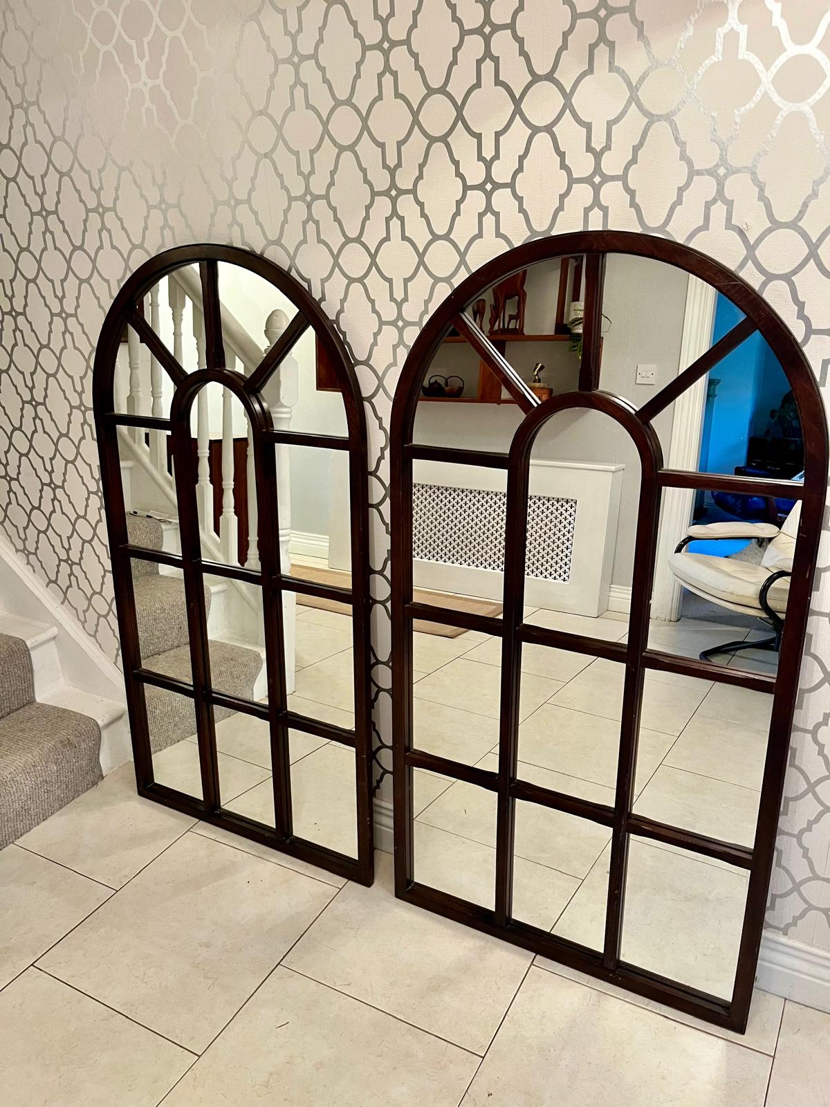 A Large Window framed mirror