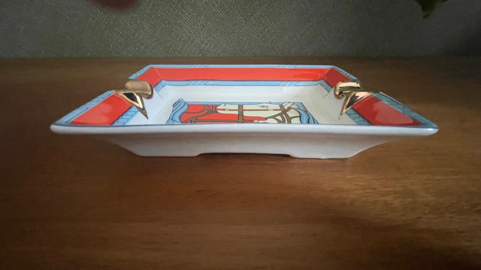 A Hermès Porcelain Ashtray.