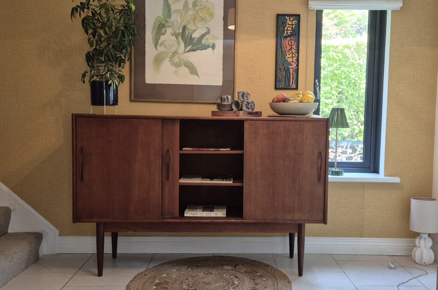 A Danish Teak High Sideboard. C.1960.