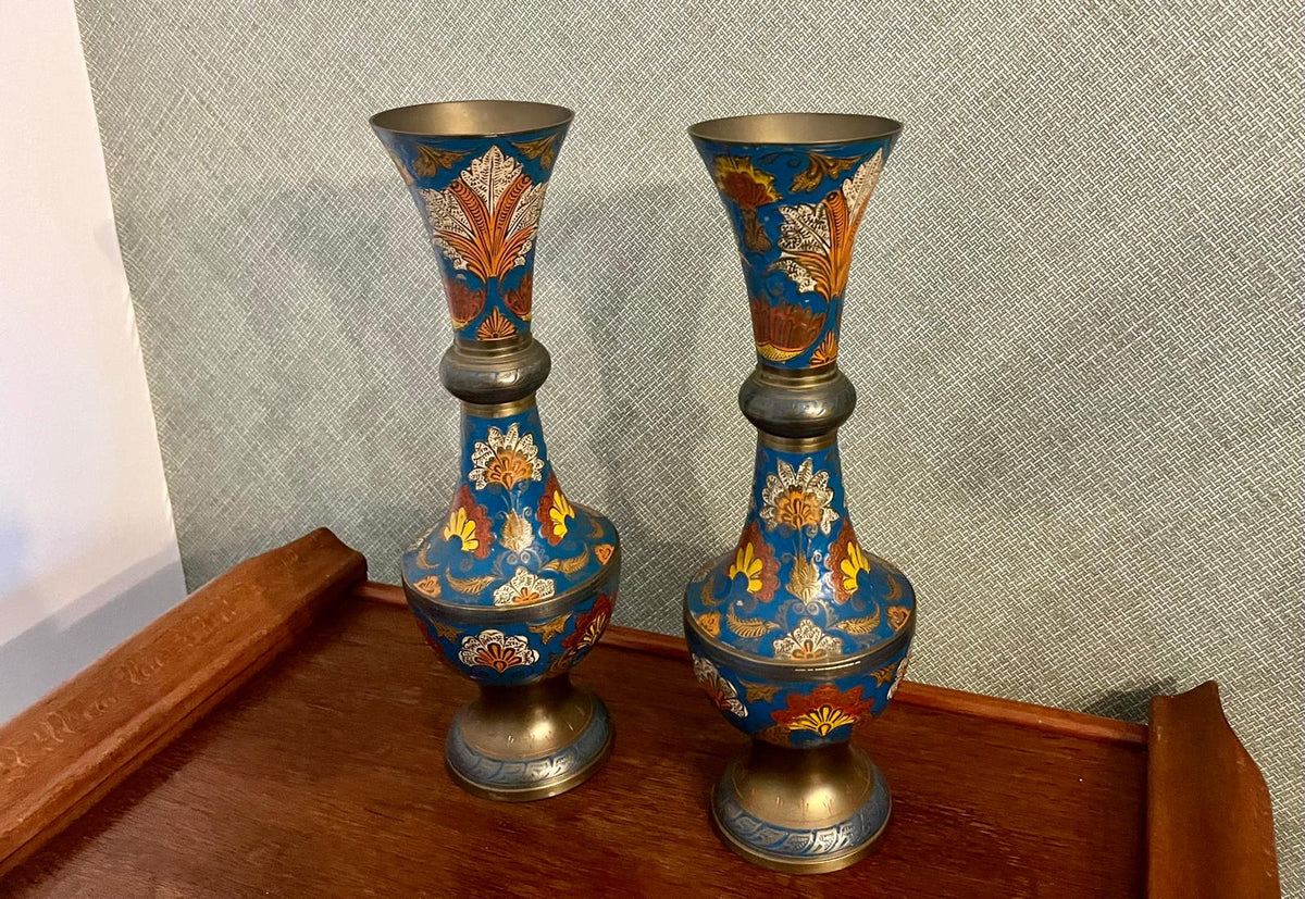 A pair of Indian enamelled brass vases