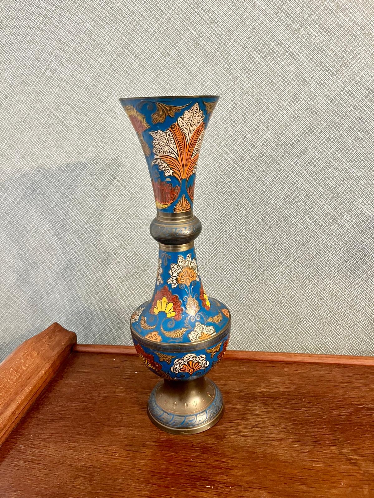 A pair of Indian enamelled brass vases