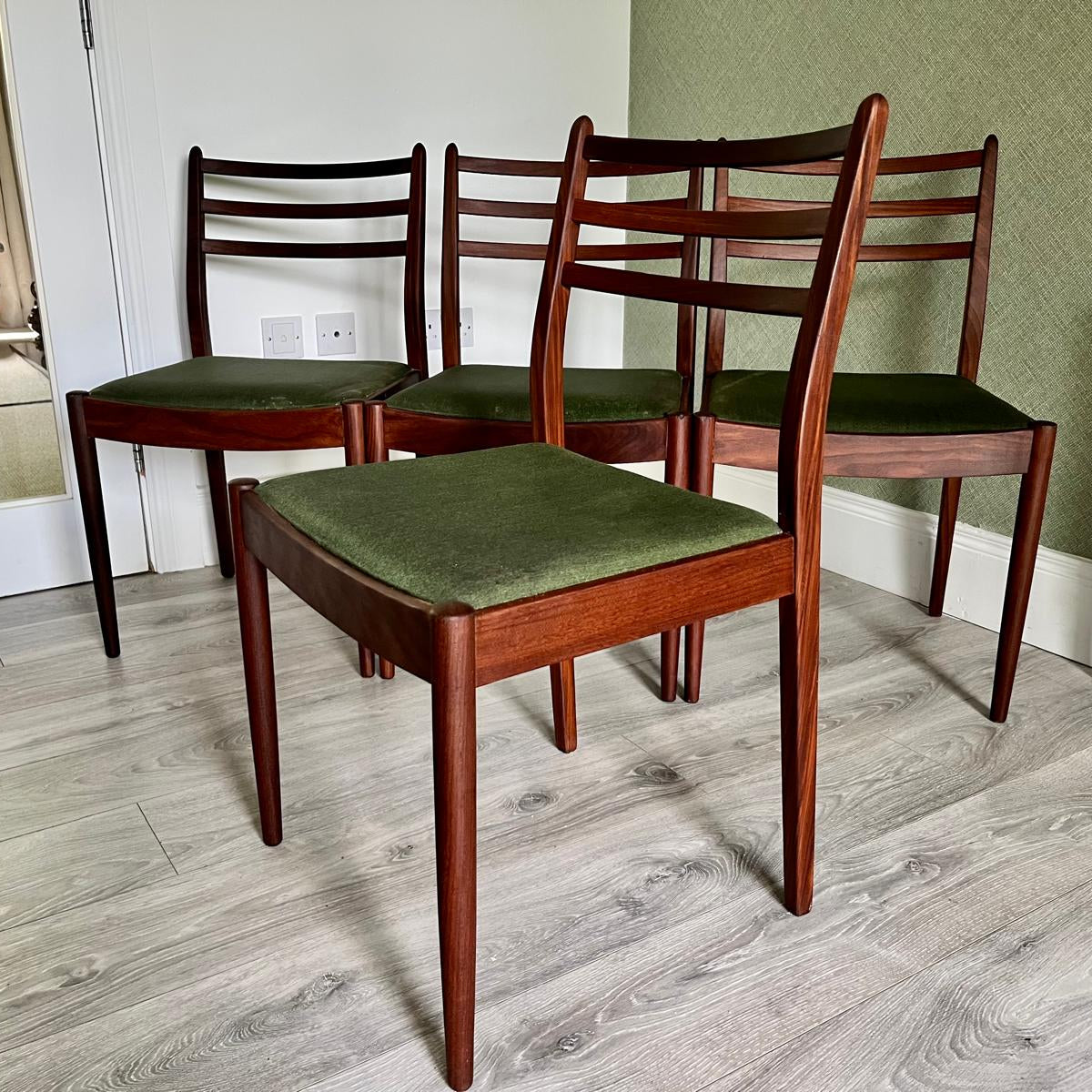 Four G Plan teak chairs with green seats by Grace & Joy Furniture