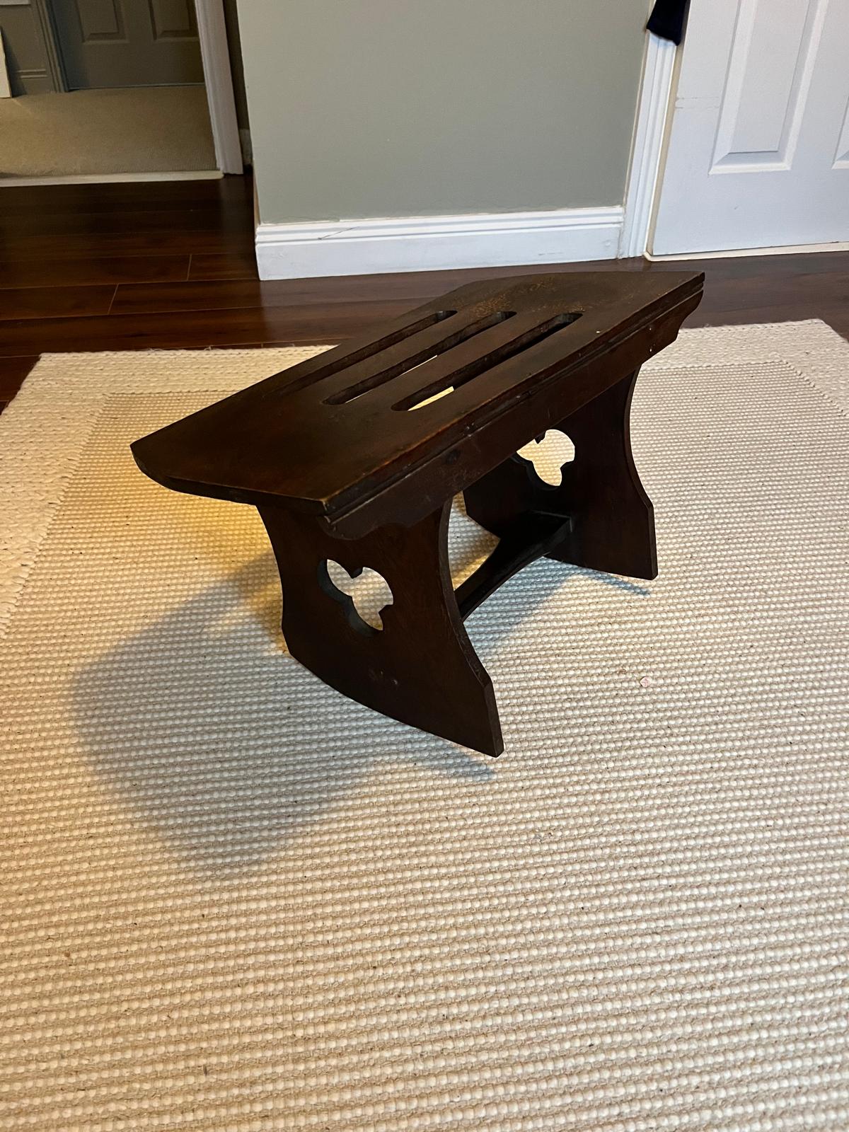 A Rustic elm rocking stool