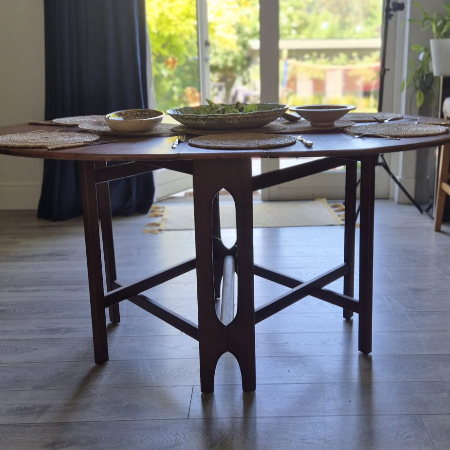 A Teak and Beech Drop Leaf Dining Table by Jentique, C.1970.