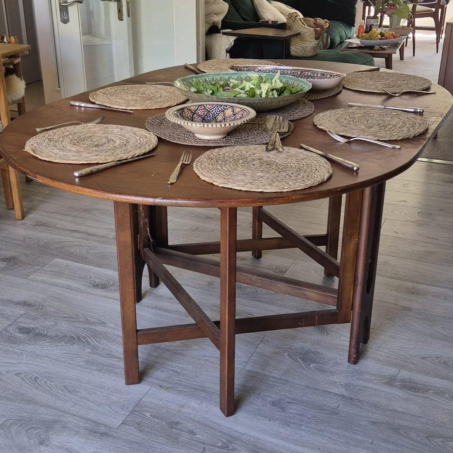 A Teak and Beech Drop Leaf Dining Table by Jentique, C.1970.