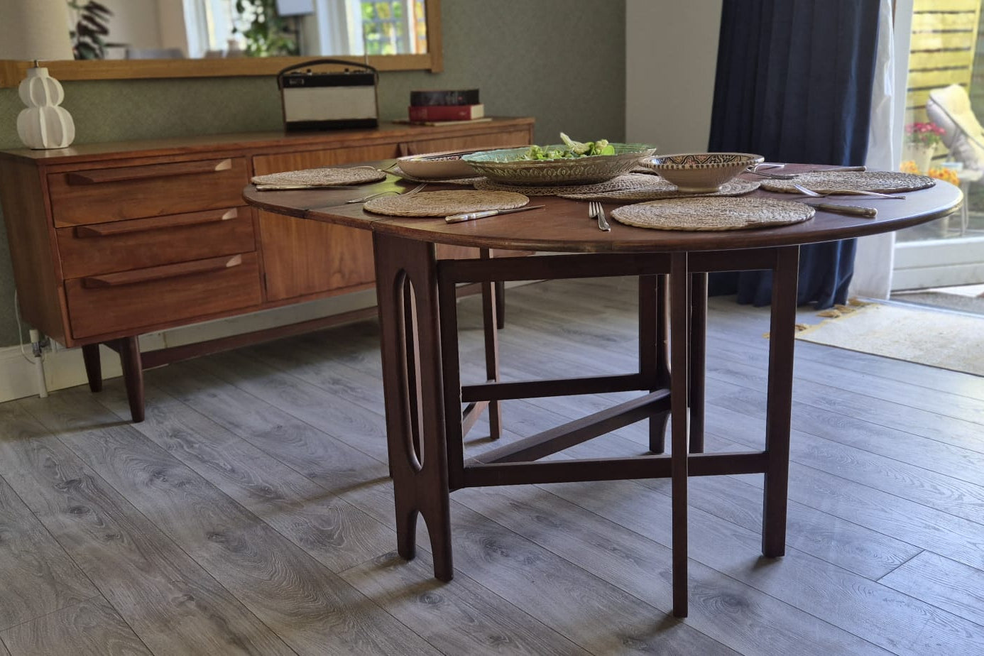 A Teak and Beech Drop Leaf Dining Table by Jentique, C.1970.