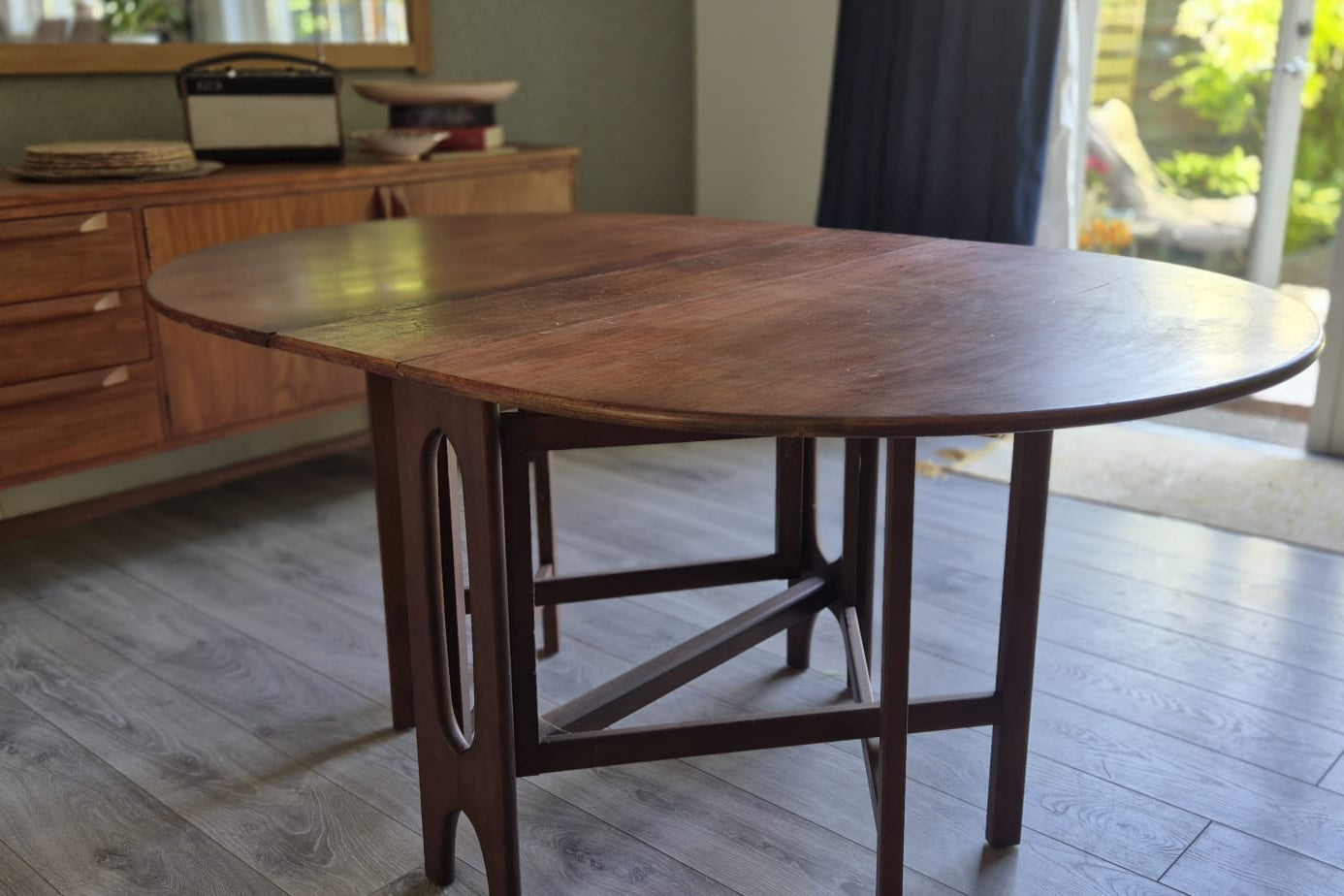 A Teak and Beech Drop Leaf Dining Table by Jentique, C.1970.