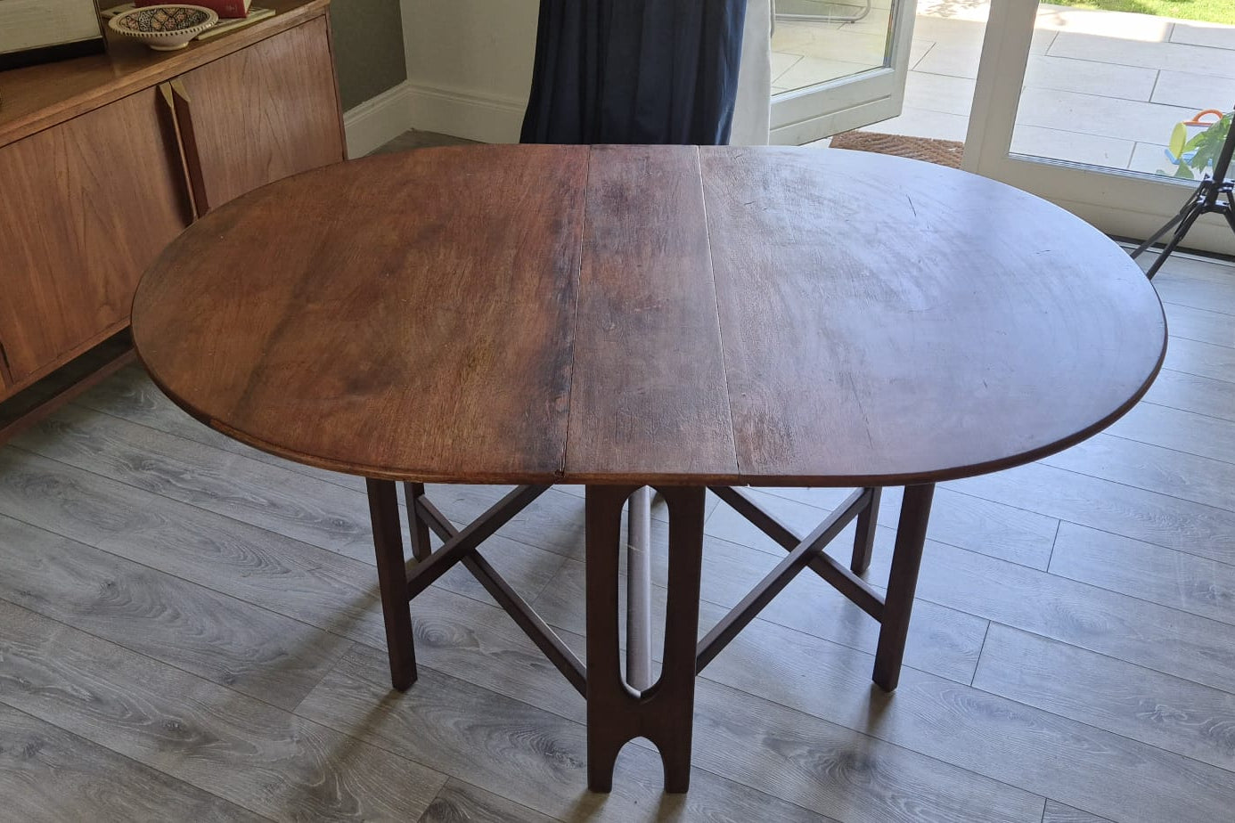 A Teak and Beech Drop Leaf Dining Table by Jentique, C.1970.